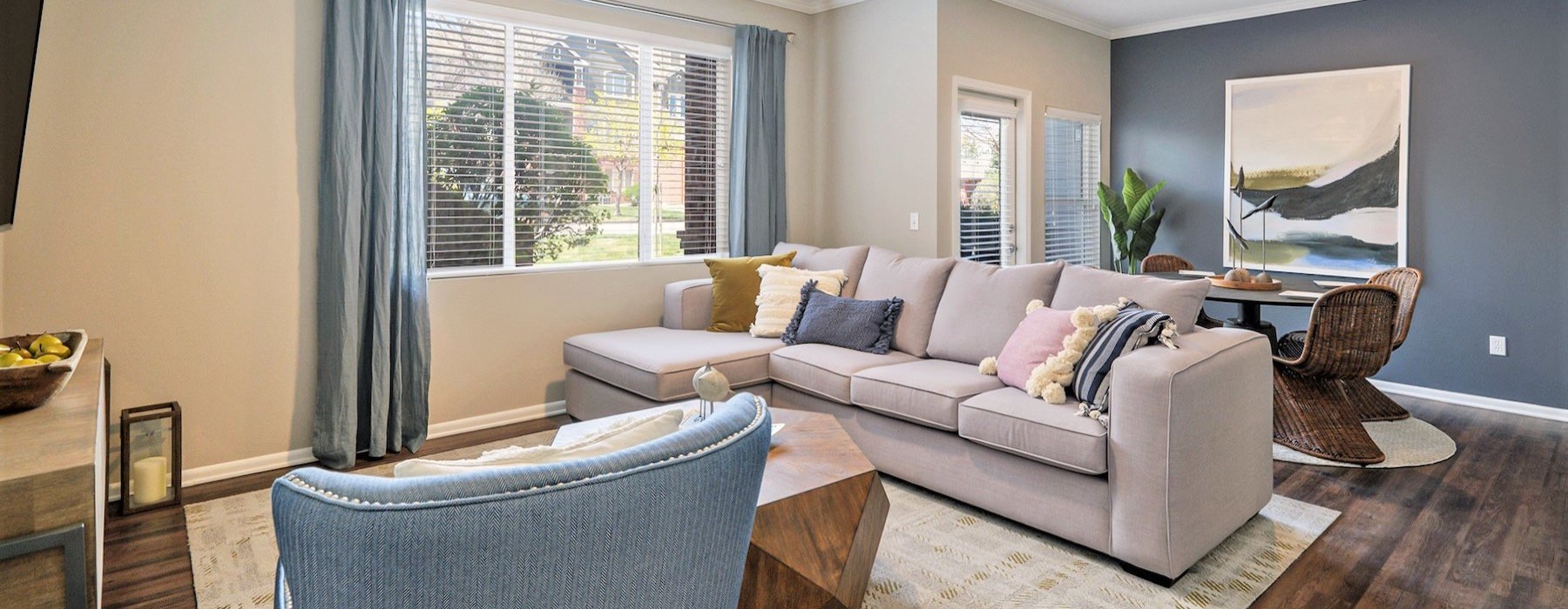 a living room with a couch and a chair