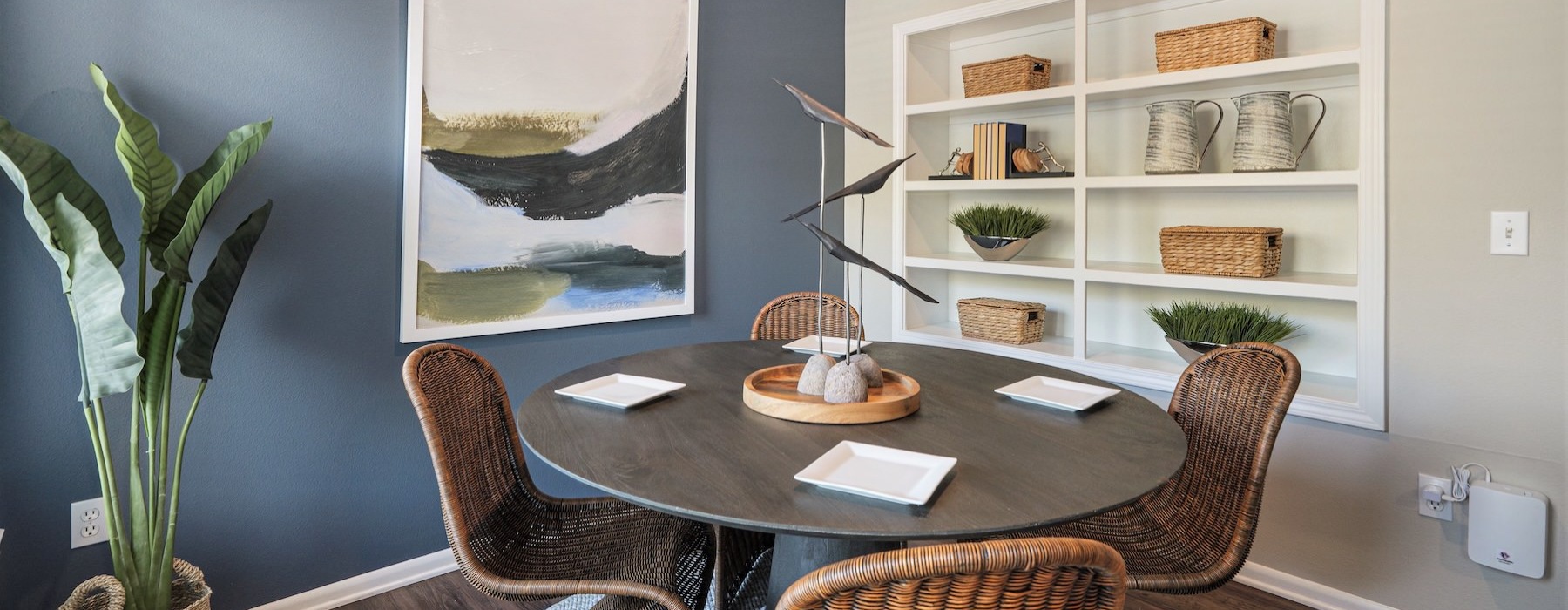 a room with a table and chairs